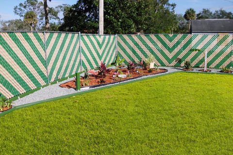Fence privacy tape woven through chain link